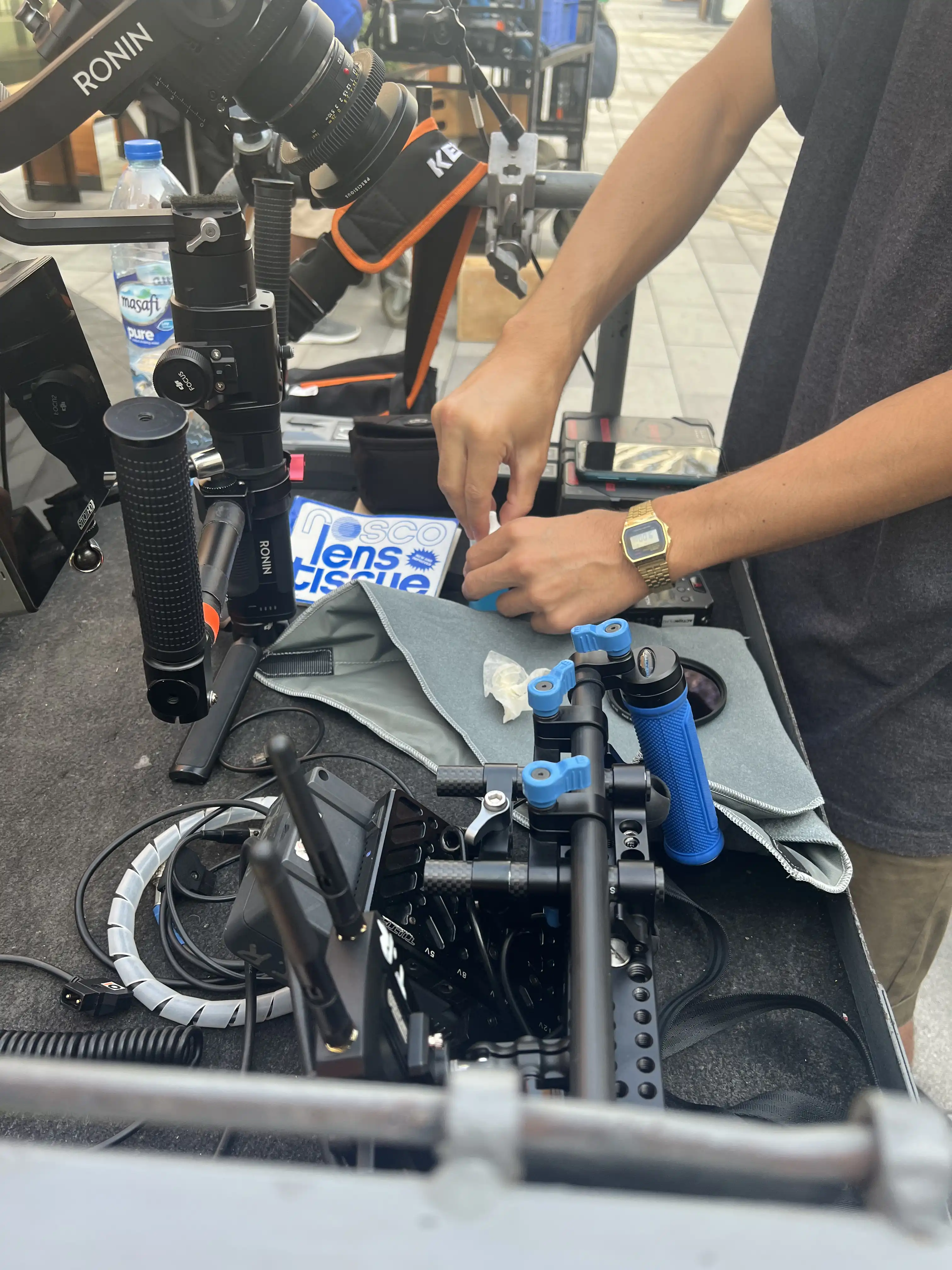 Hands working on a camera